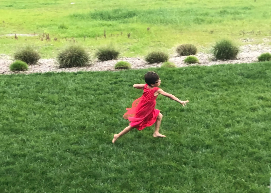 This isn't a boy in a dress. It's a child dressed in bliss