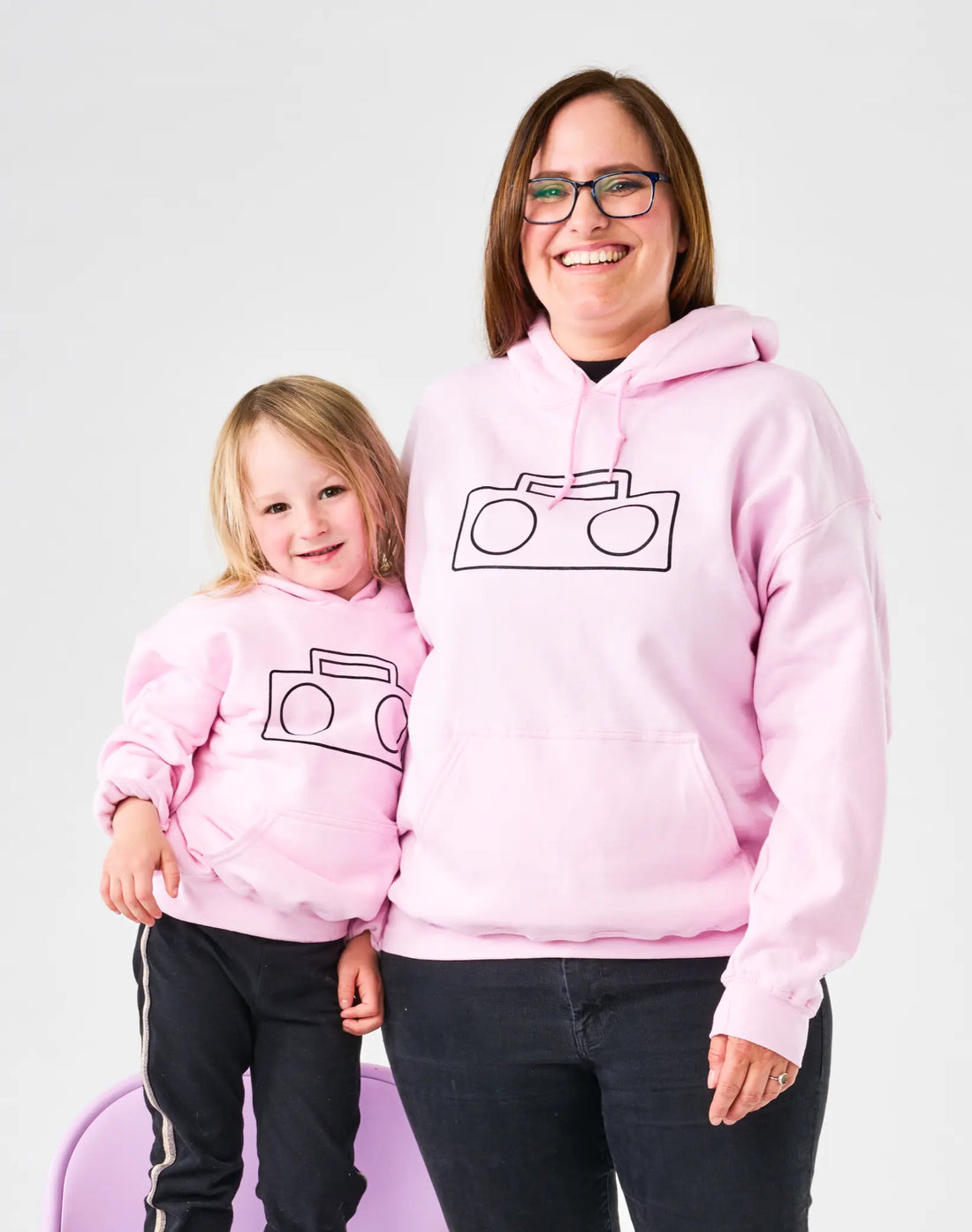Adult and child wearing matching StereoType Kids pink Boombox Logo Hoodies, Mini-Me style