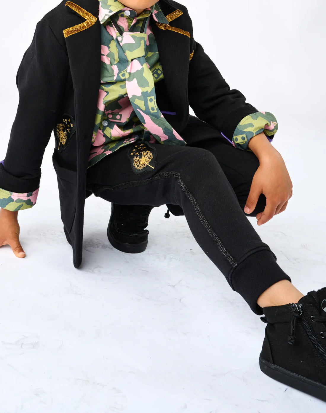 Stereotype Kids Boombox Knit Sweats styled with OG Boombox Blazer and camo shirt showing black sparkle leg trim