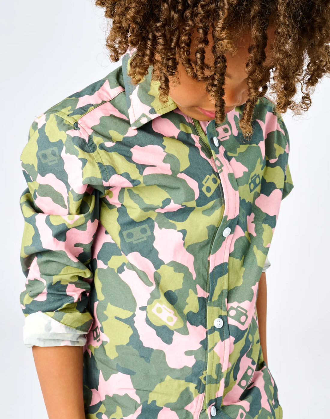 Stereotype Kids Boombox Camo Zip Shirt showing exclusive pink and green camo print with floating boombox graphics -  STK original design