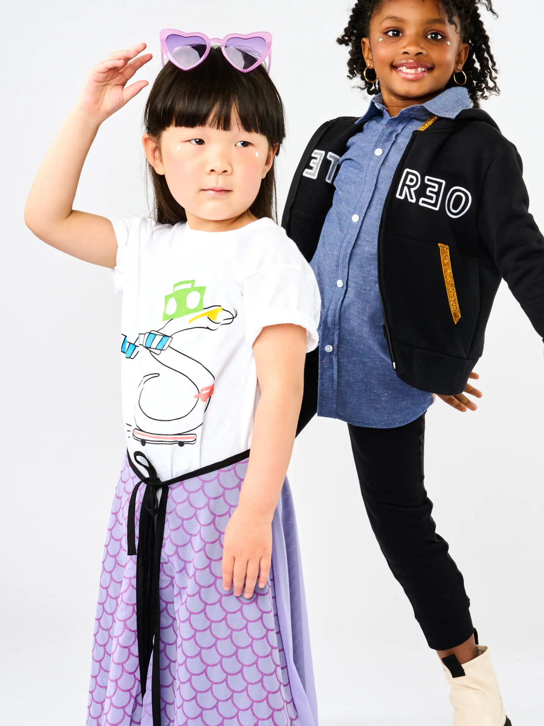 Kids wearing StereoType gender-inclusive Stereo the Snake tee and sparkle hoodie jacket with Chambray button down zip up shirt